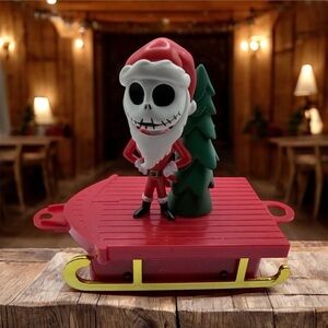 Disney Festive Jack Skeleton Santa with Red Sled and Green Tree
